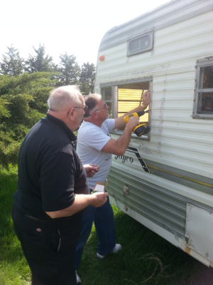 NNØO and ABØDX installing
rebuilt window, replacing old window air conditioner and window.