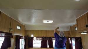 Jane putting finishing touches on the interior